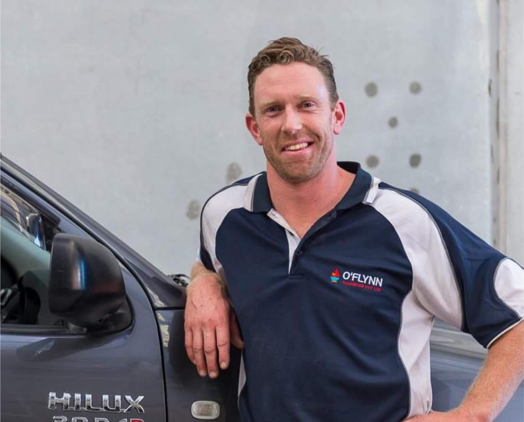 Ryan O’Flynn of O’Flynn Plumbing and his dog head out on a job in the van.