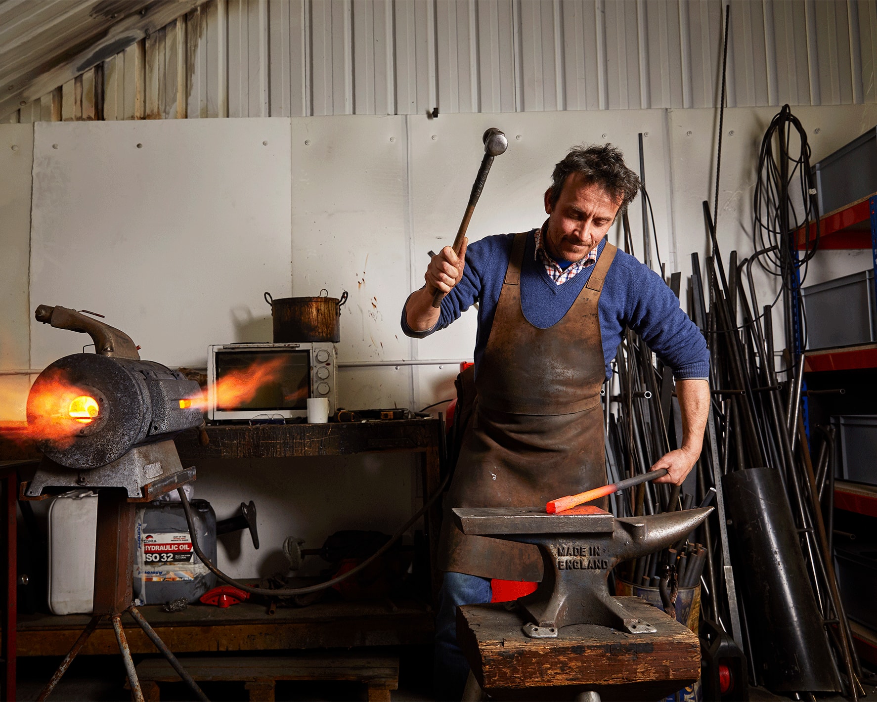 Blacksmith, Richard doing metalwork. He uses Xero accounting software.