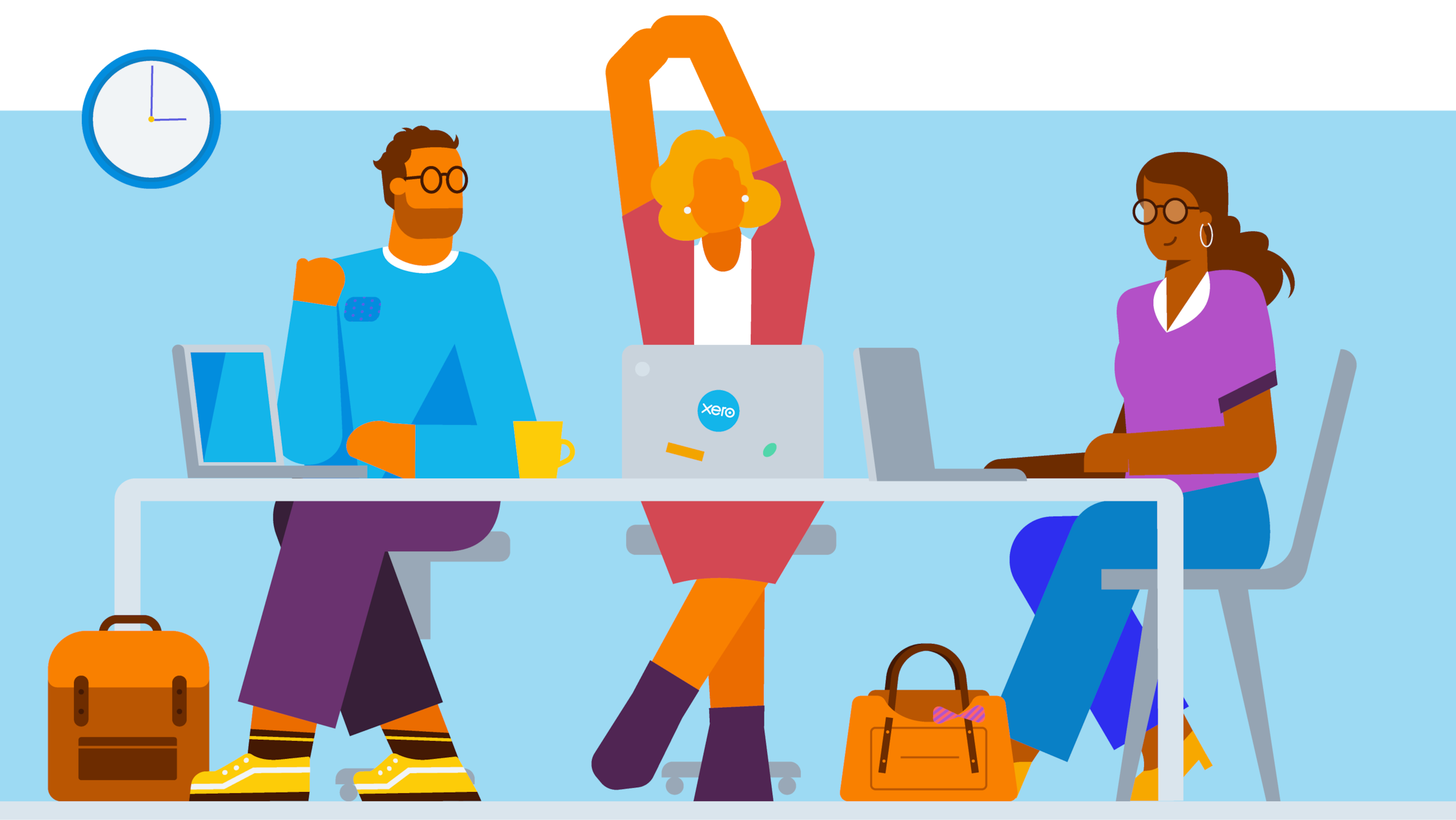 Three people sitting at a table discussing gender equality in the workplace
