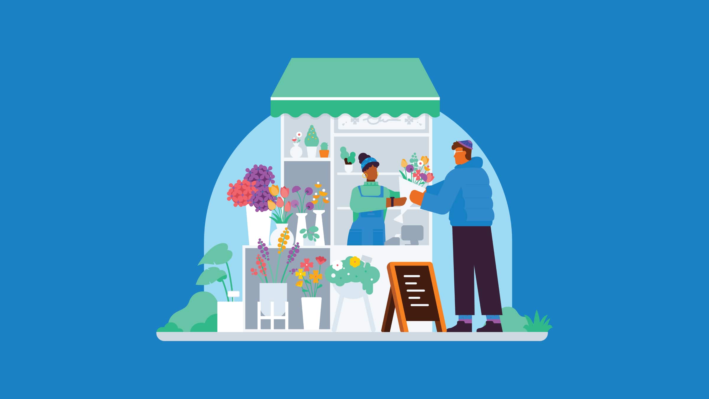 A market vendor hands a bunch of flowers to a customer.