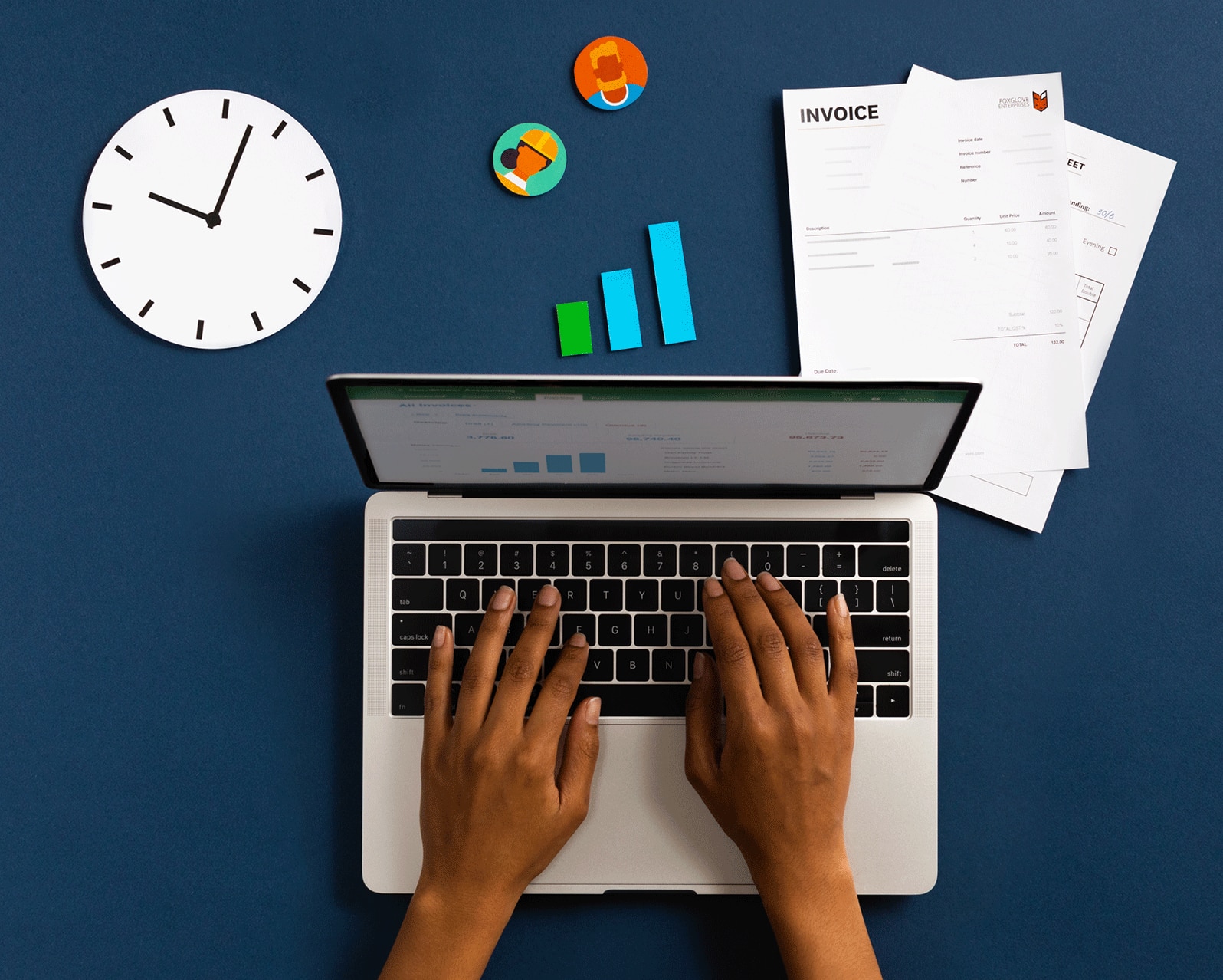 An accountant customises reports for the practice on a laptop.