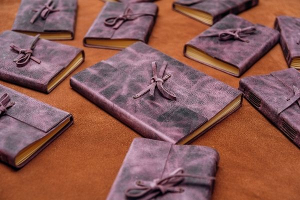 A soft cover is easier to fit in a suitcase